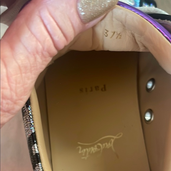 Black & Purple Women's Sneakers
made in Paris by Christian LOUBOUTIN
Red bottom - Picture 8 of 16